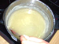 Preparar un almibar en un cazo para ello hervir el agua con 1/2 kg de azúcar y dejar al fuego hasta conseguir que alcance el punto de hebra ( se formará un hilo elástico)...